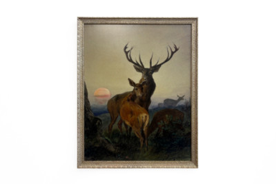 En kronhjort med en hjort i et skovklædt landskab ved solnedgang - Carl Friedrich Deiker