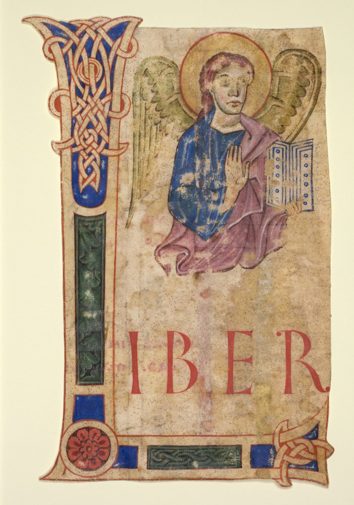 Miniature udskåret fra en evangelisk bog: Symbolet for St. Matthæus recto og kanontabeller verso. af Unbekannt