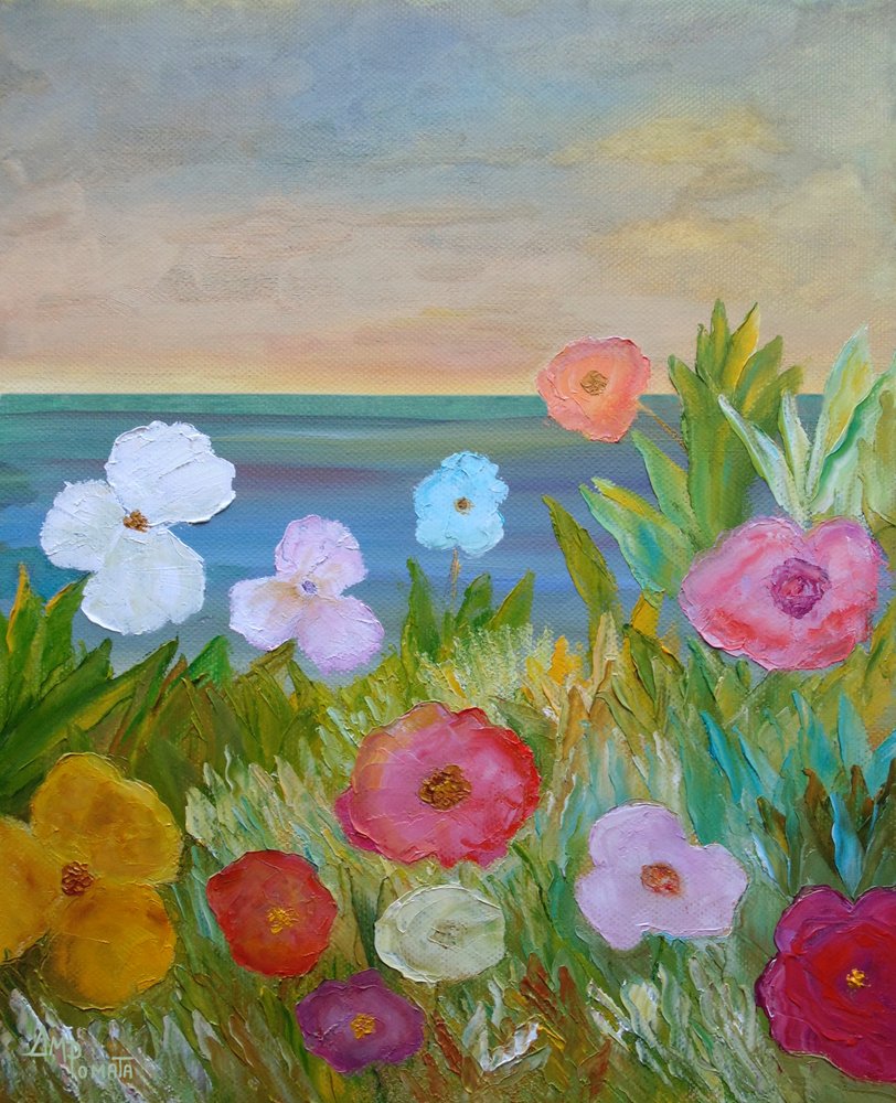 Farverige blomster og havudsigt af Angeles M. Pomata