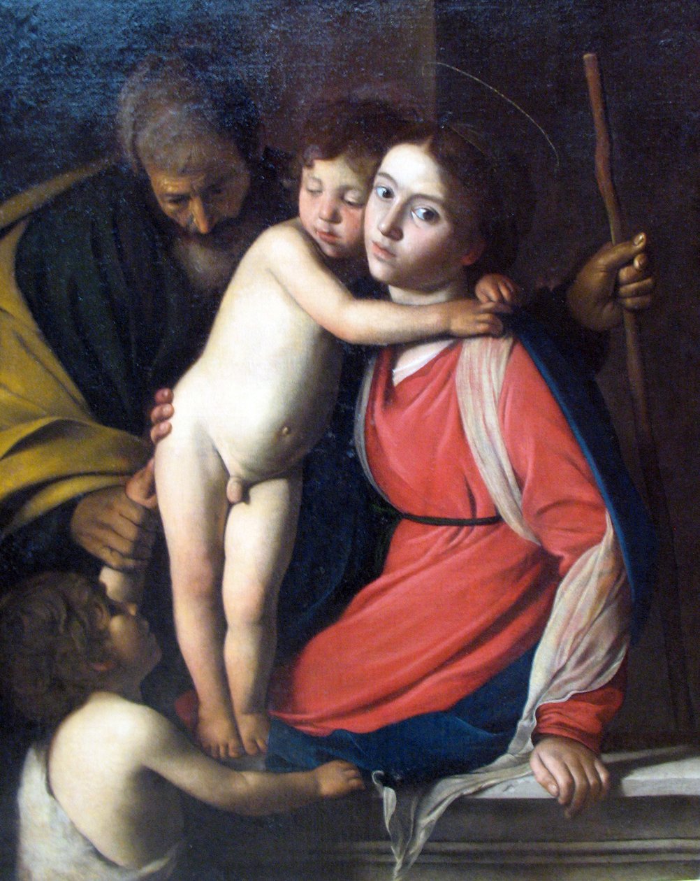 Den hellige familie med spædbarnet Johannes Døberen af Michelangelo Merisi Caravaggio