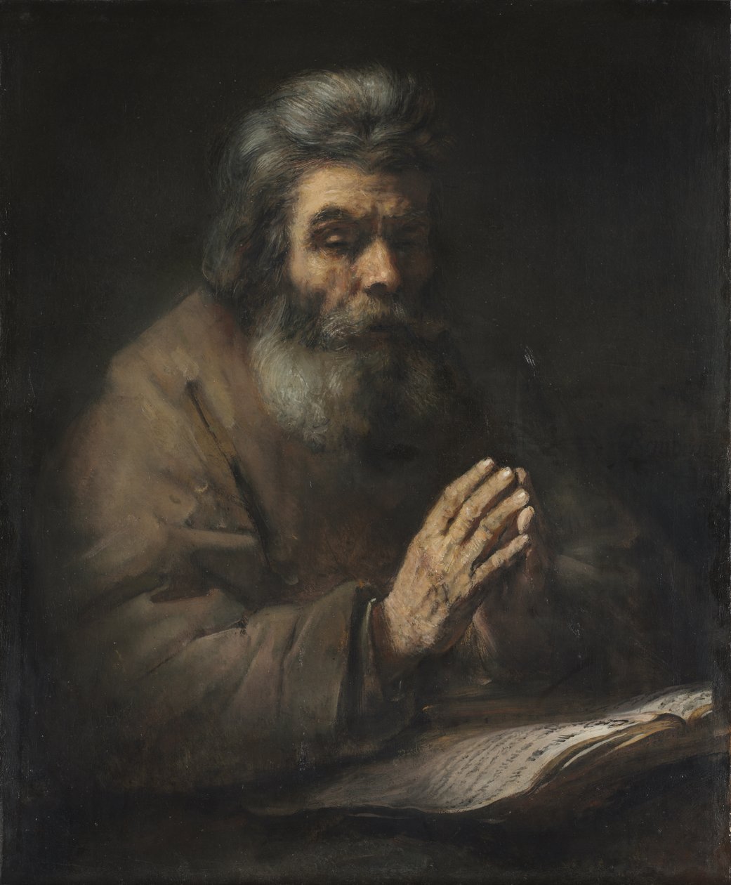 En ældre mand i bøn af (follower of) Rembrandt Harmensz. van Rijn