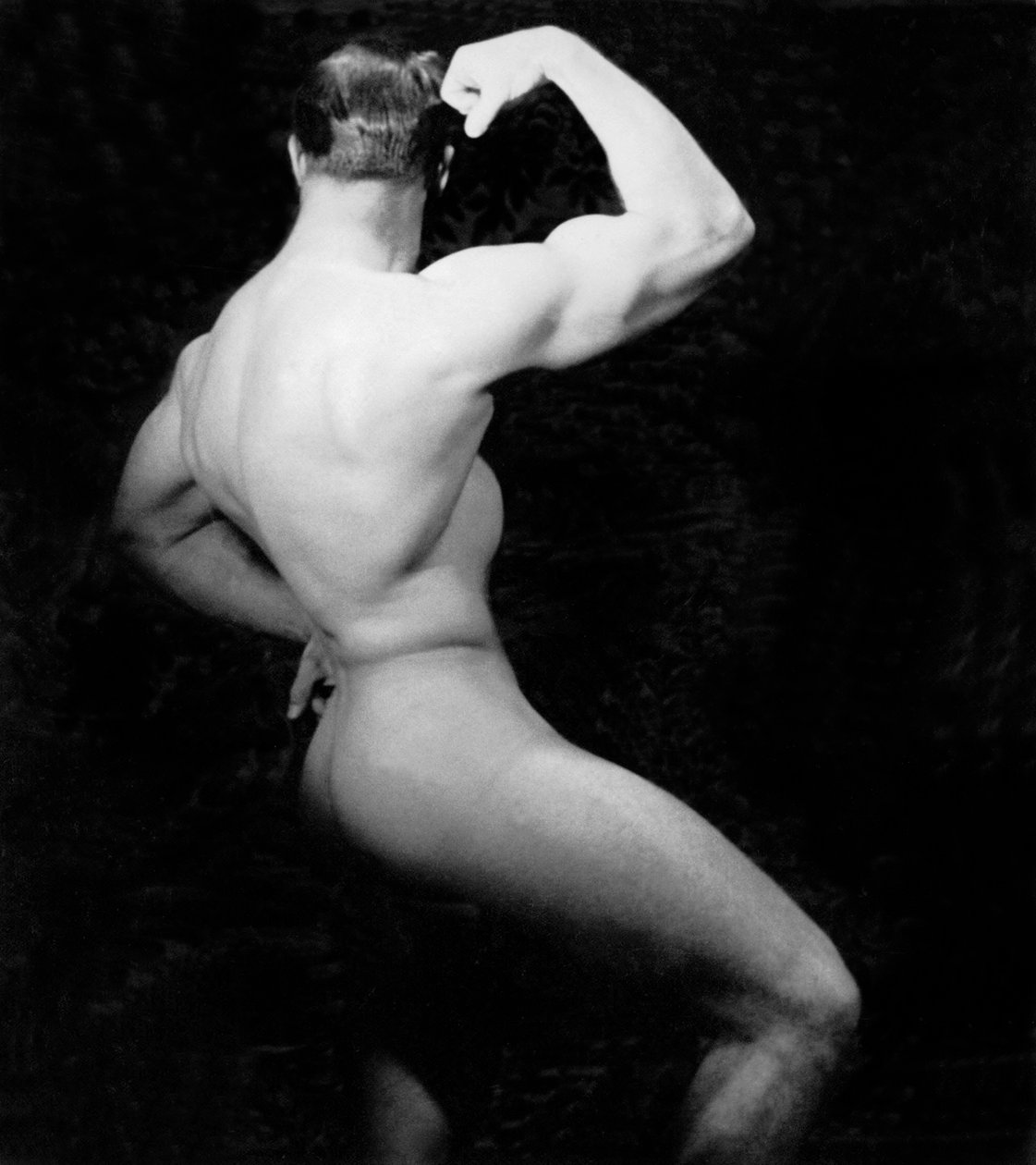 Nøgen bodybuilder fra siden, San Francisco, Californien, ca. 1950 af Unknown