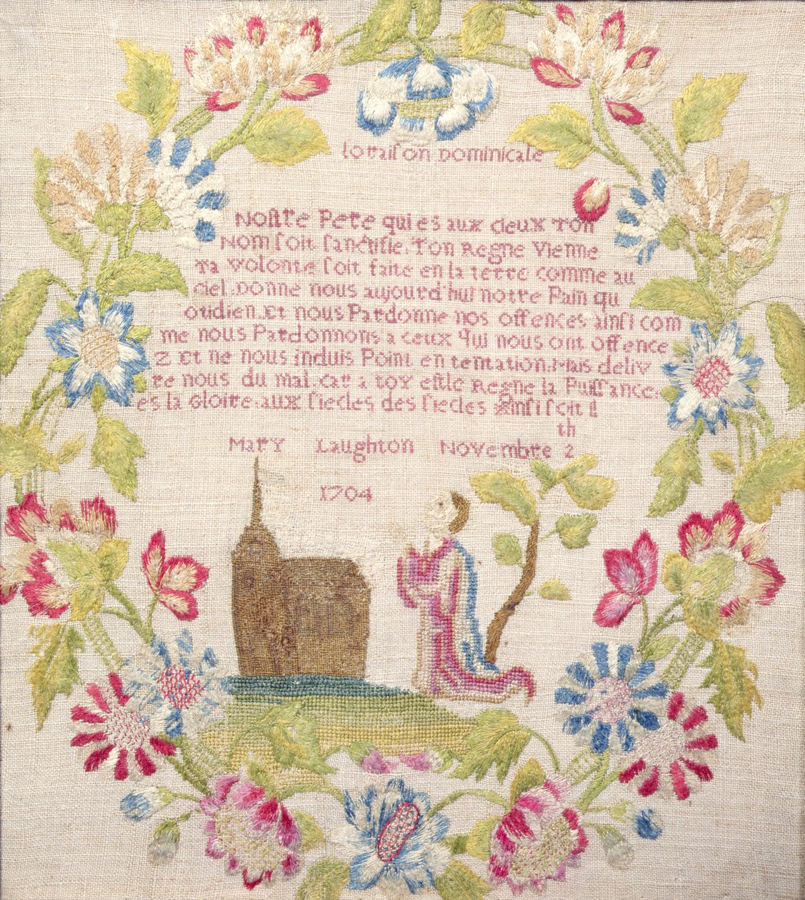 Sampler med Lords Prayer på fransk over en knælende figur, udført af Mary Laughton, 1704 (silkearbejde) Mary Laughton, 1704 af Unknown