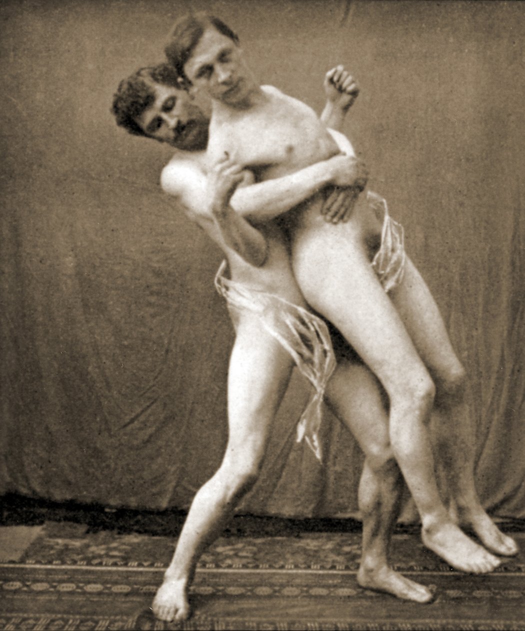 Wrestlere demonstrerer taljegrebet, ca. 1910 (sepia-billede) af Unknown