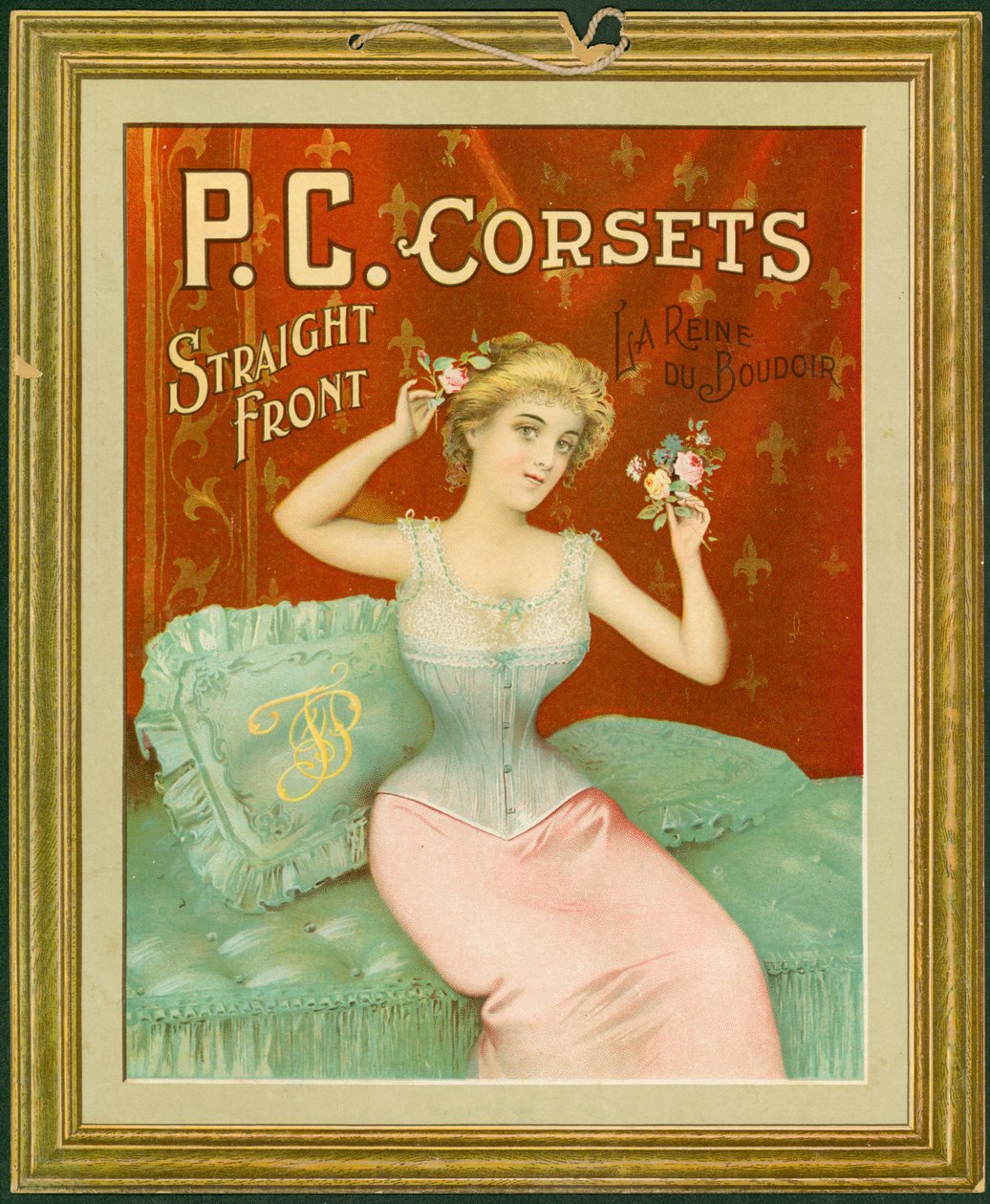 P.C. Korsetter, lige foran, La Reine Du Boudoir (farve litho på kort med hængesnor) af American School