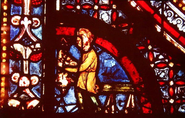 En slagter, detalje fra nederste venstre hjørne af Miracles of the Virgin Window i skibets sydlige sideskib, 1205-15 af French School