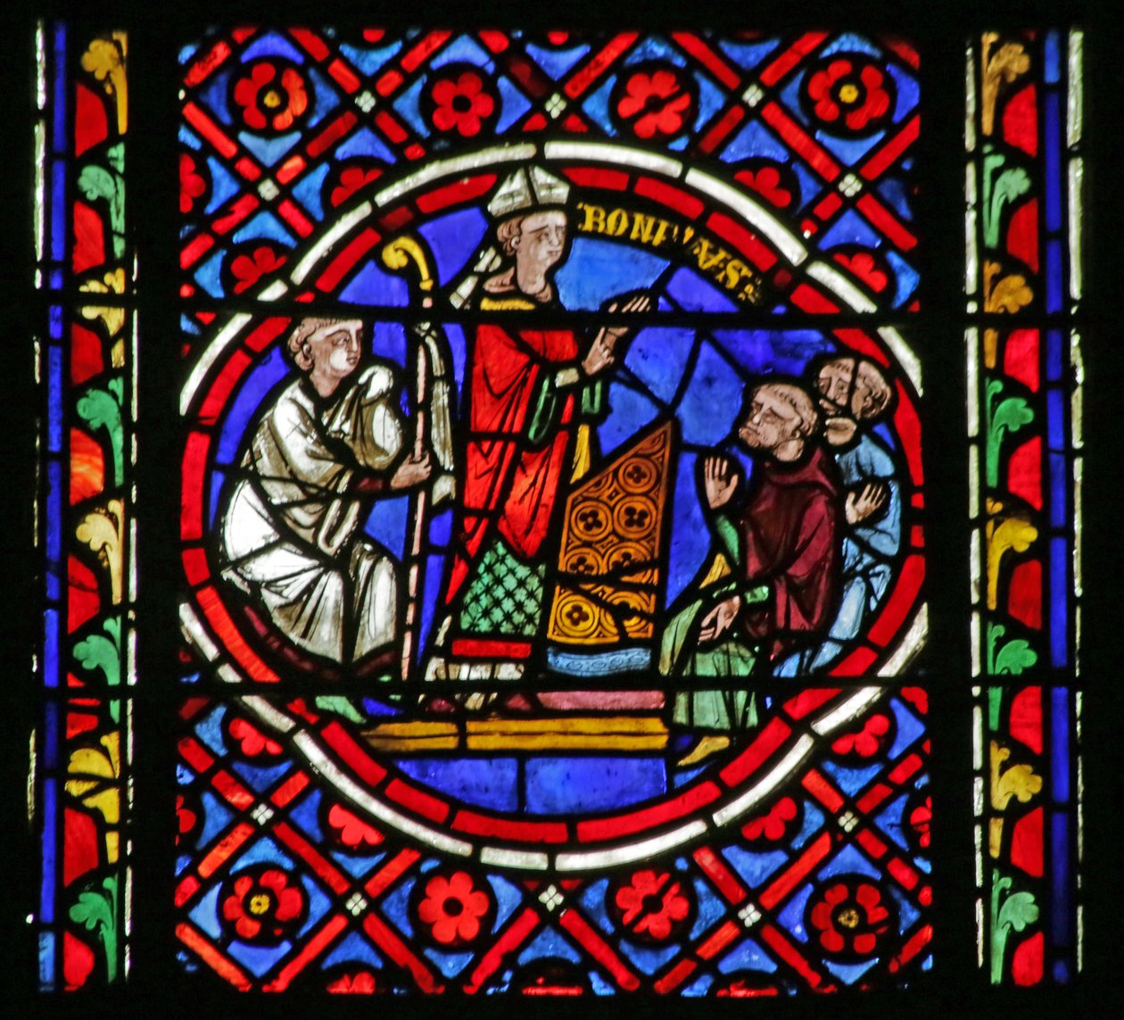 Vindue, der viser Scene fra Saint Bonnets liv: Blanda kommer til Saint Bonnet og takker af French School