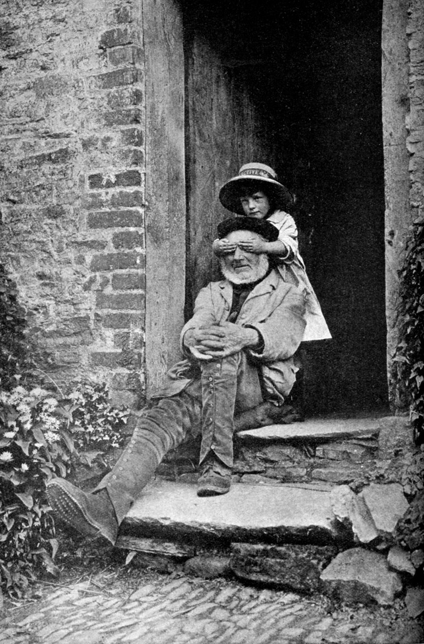 Et barn med sin bedstefar, England, c1922. af A. W. Cutler