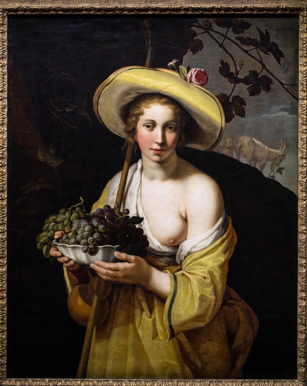 Bergere med en skål druer af Abraham Bloemaert