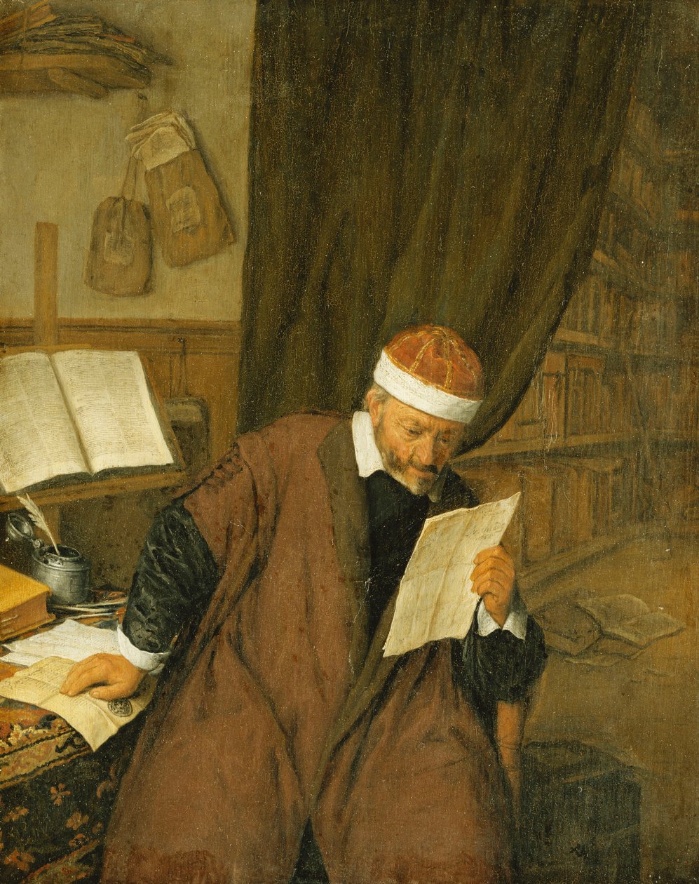 En advokat sidder ved et skrivebord og læser et brev, et bibliotek hinsides, 1668 af Adriaen Jansz. van Ostade