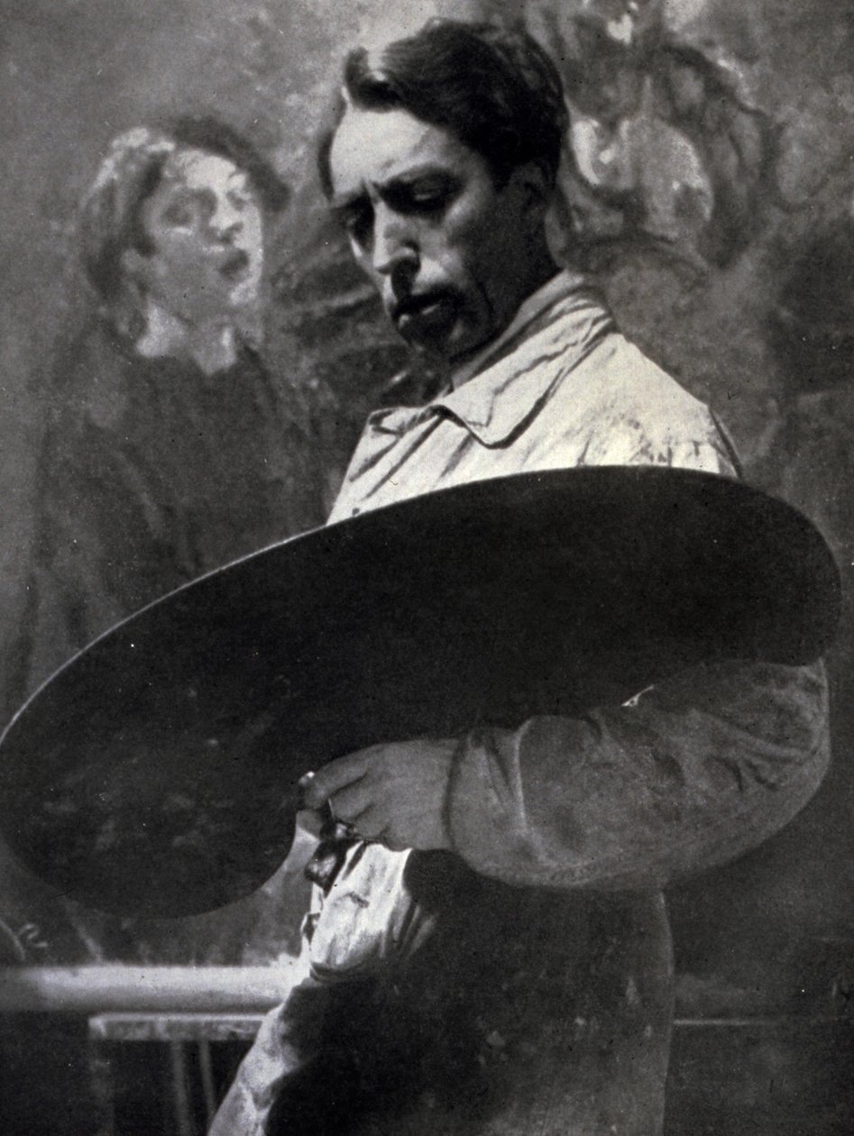Portræt af maleren Tullio Silvestri på arbejde i sit atelier. Kunstneren poserer og ser på sin palet, som han holder, hvilket antyder intensiteten af det kreative øjeblik i processen (s/h foto) af Alberto Segre