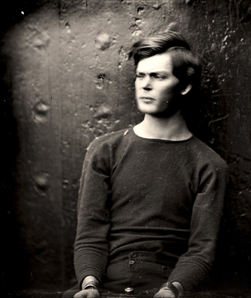 Lewis Powell i håndledsjern ombord på USS Saugus, 1865 af Alexander Gardner