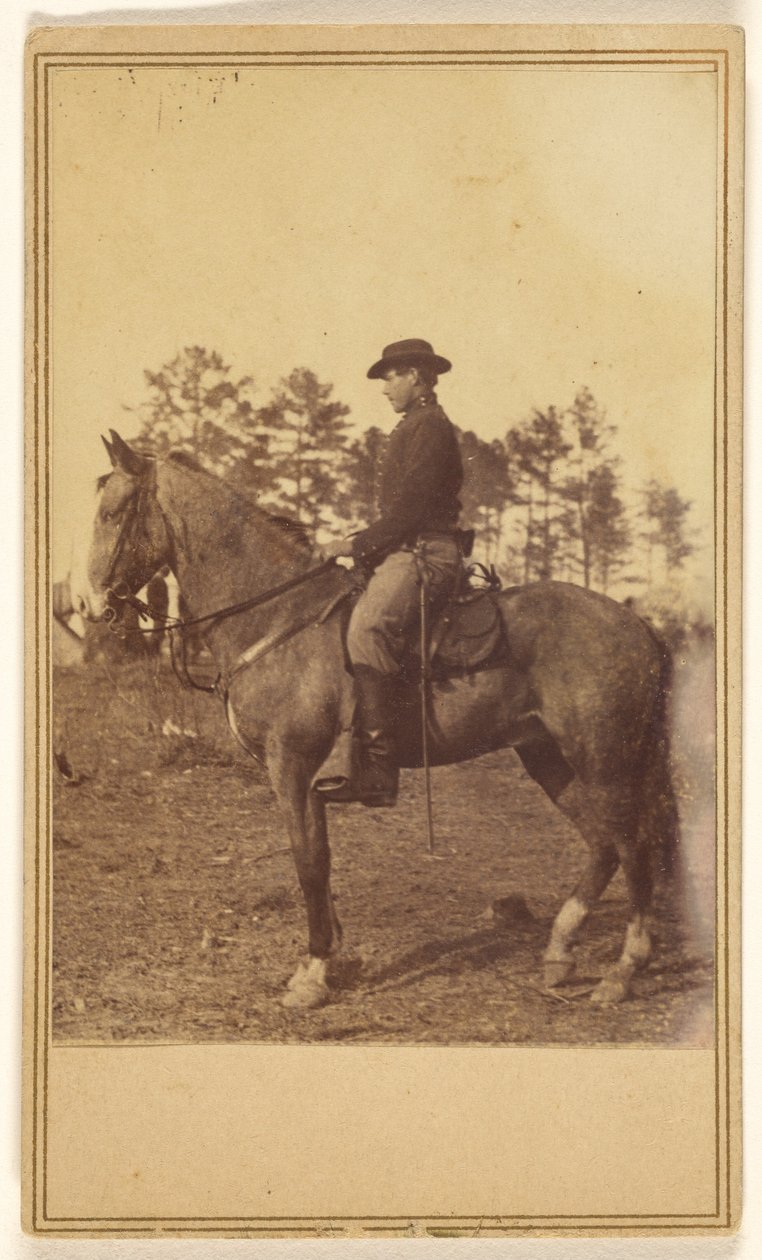 [Mand med hat, i profil, på hesteryg]. af Alexander Gardner