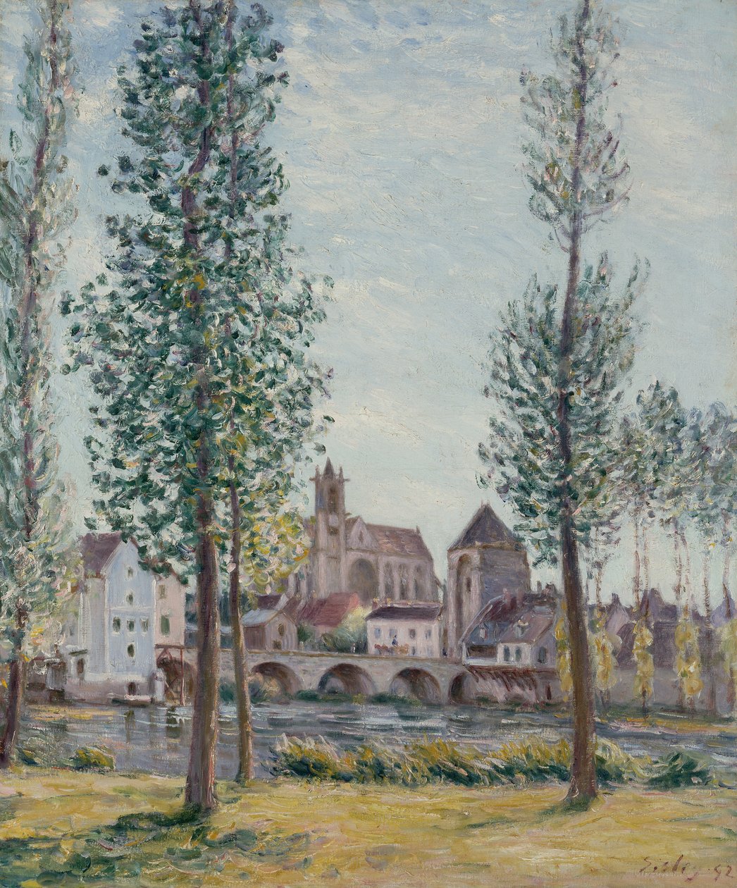 Udsigt over Moret sur Loing gennem træerne af Alfred Sisley