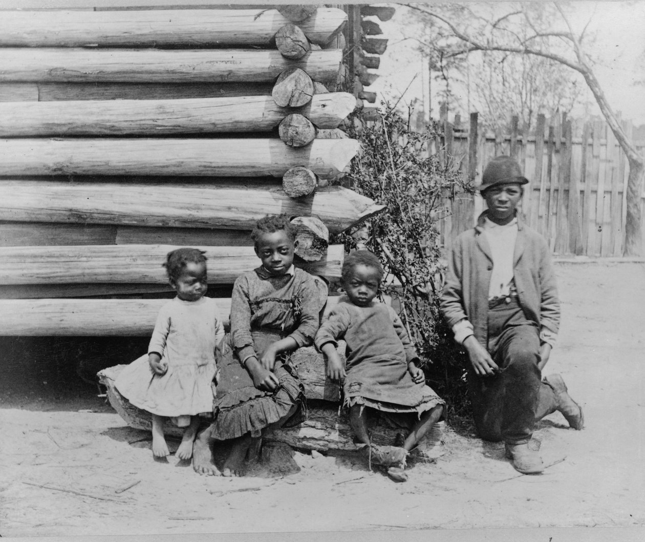 Afroamerikansk mand med børn nær Thomasville, Georgia af American Photographer