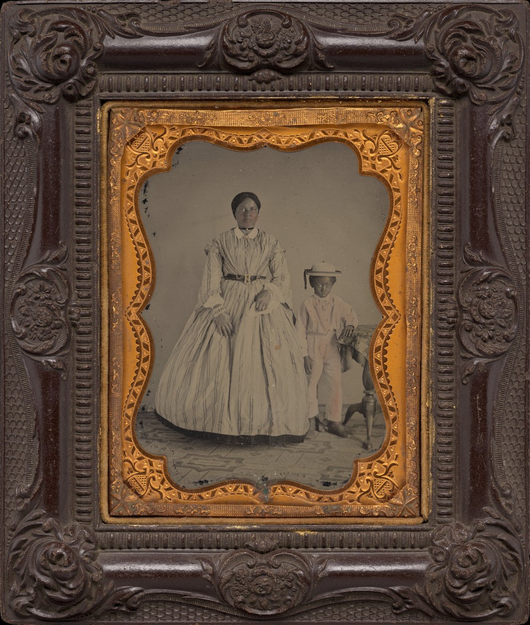 Portræt af en kvinde og en dreng,ca. 1863 (foto) af American Photographer