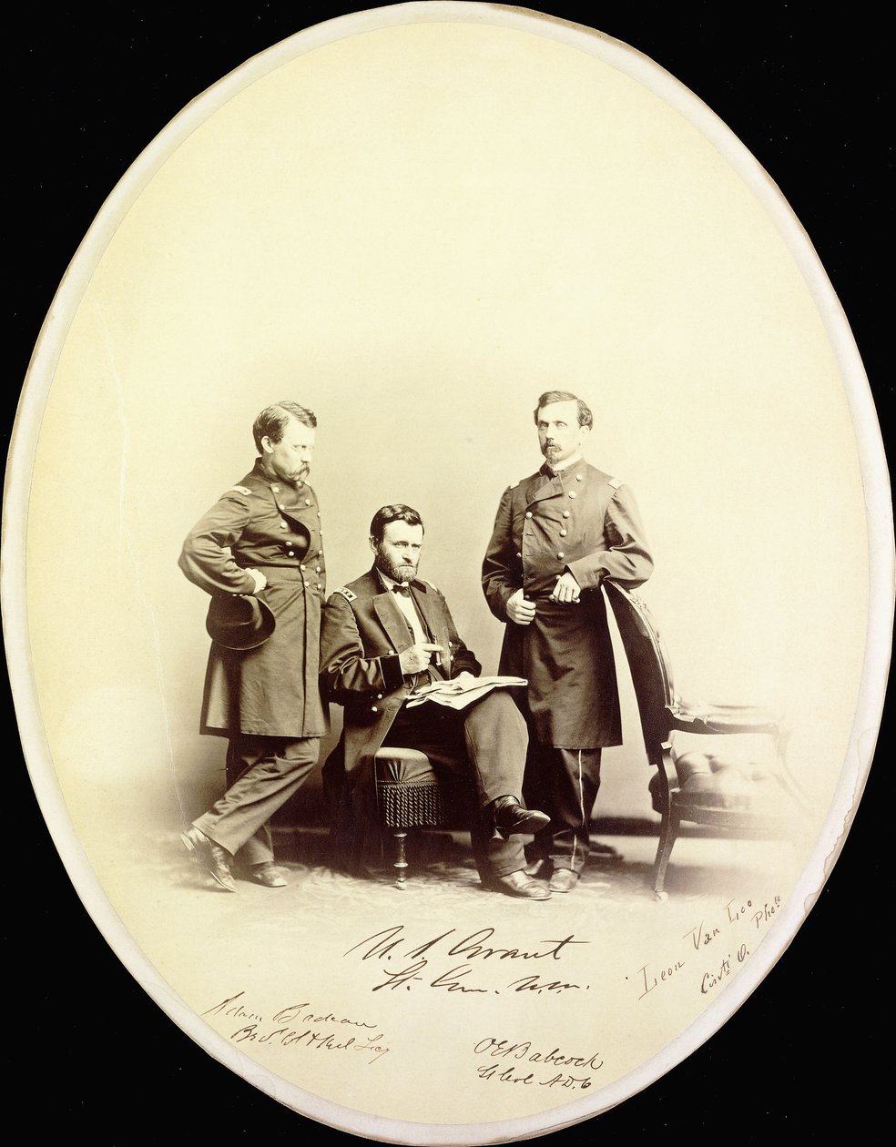 Signed photograph of Ulysses S. Grant and his aides, Orville E. Babcock and Adam Badeau, in military uniform, c.1865dani af American Photographer