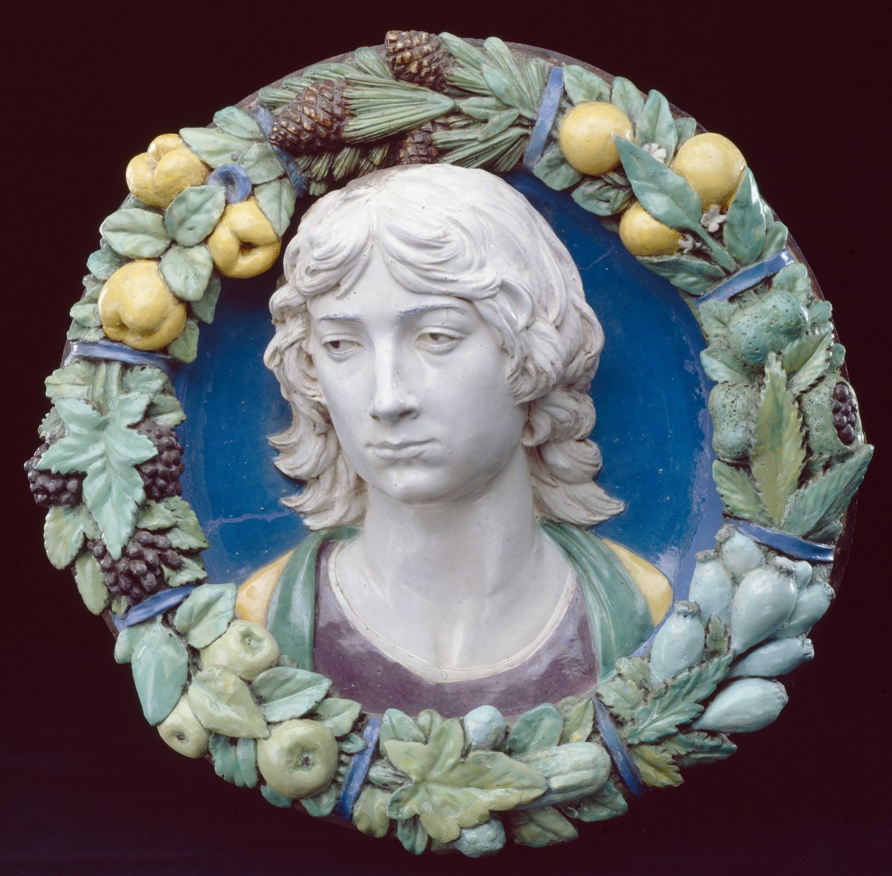 Head of a Youth (emaljeret terracotta) af Andrea Della Robbia