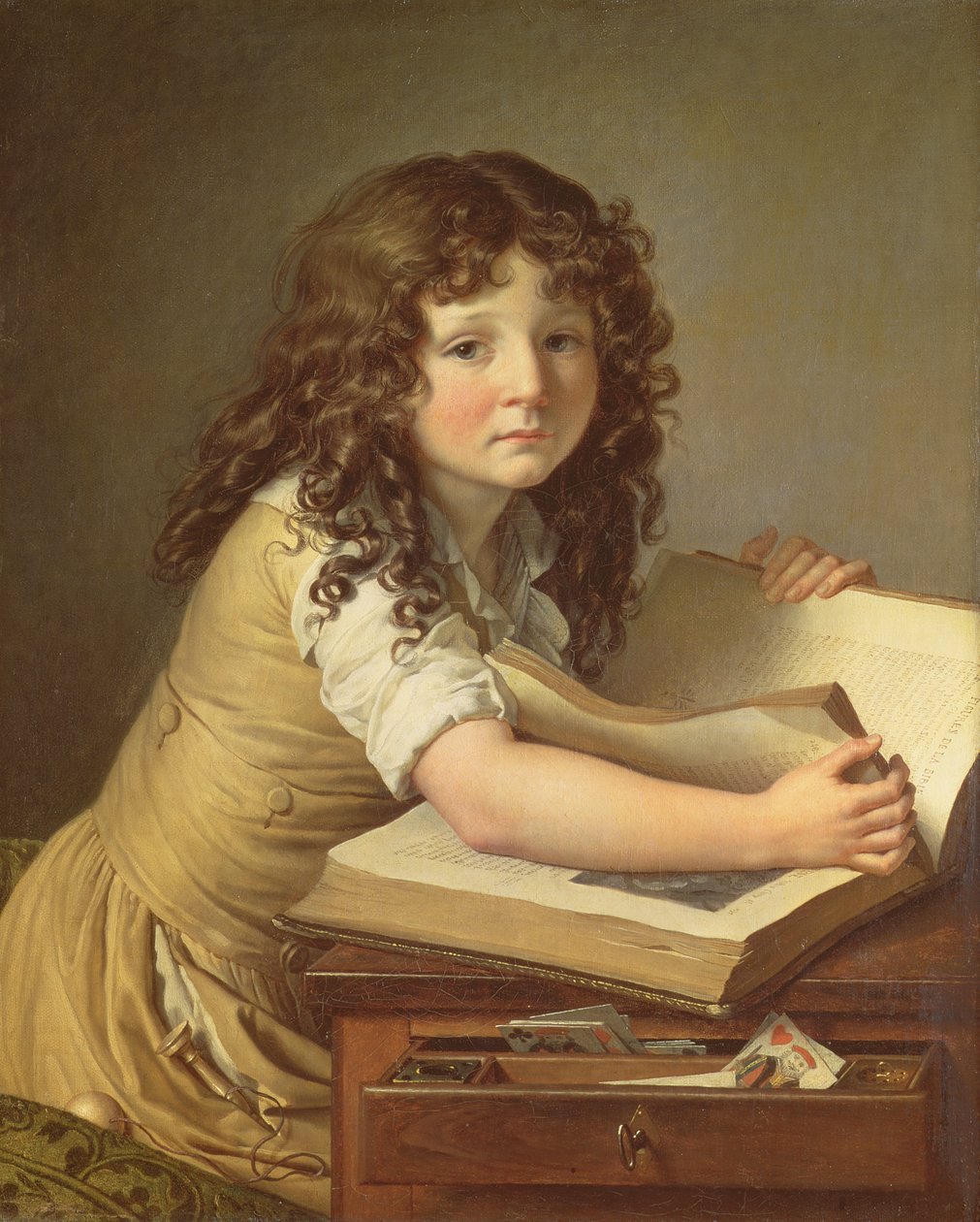 Et barn, der ser på billeder i en bog af Anne Louis Girodet de Roucy Trioson