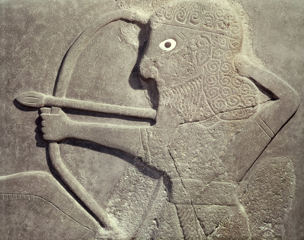 Relief, der forestiller en jæger, fra Tell-Halaf, Syrien (basalt) (detaljer) af Assyrian