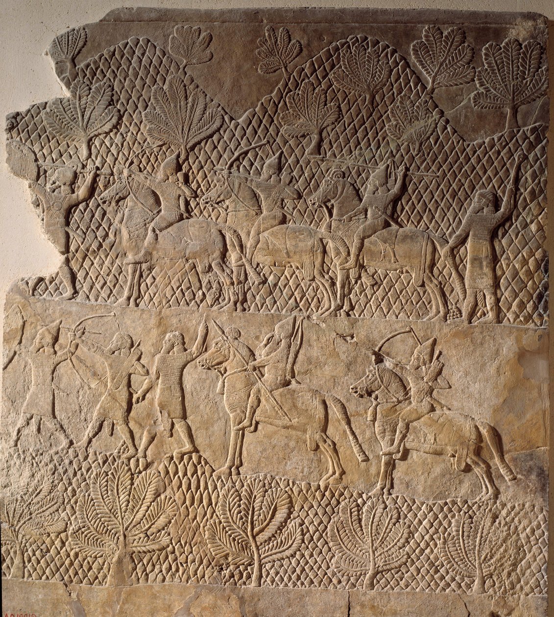 Orientalsk kunst fra antikken: kampscene. Lavrelief af Assurbanipal Palace, Assyrien (7. århundrede f.Kr.). Paris, Musée du Louvre af Assyrian