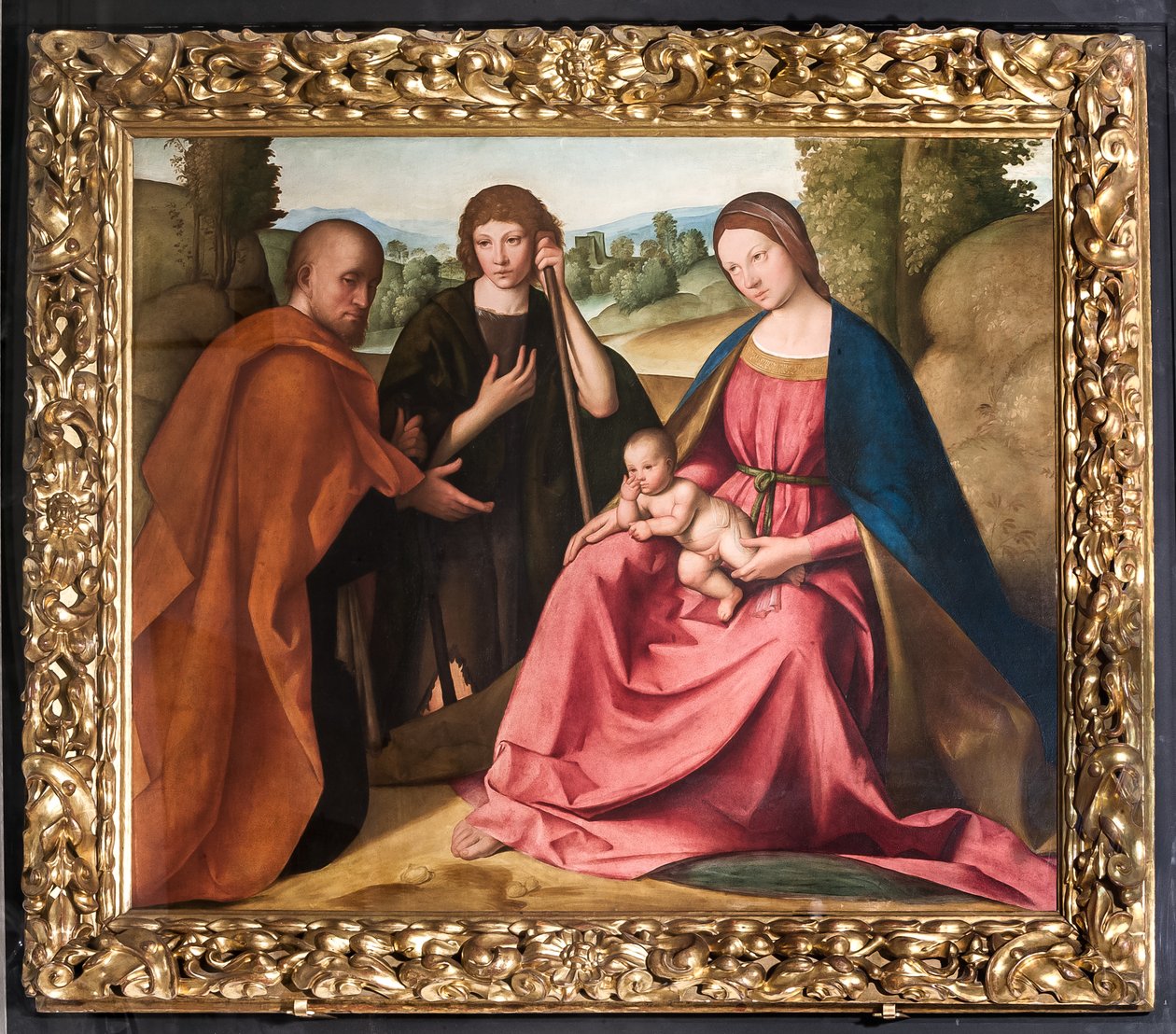 Tilbedelse af hyrderne Madonna med spædbarnet Jesus og to hyrder") af Boccaccio Boccaccino