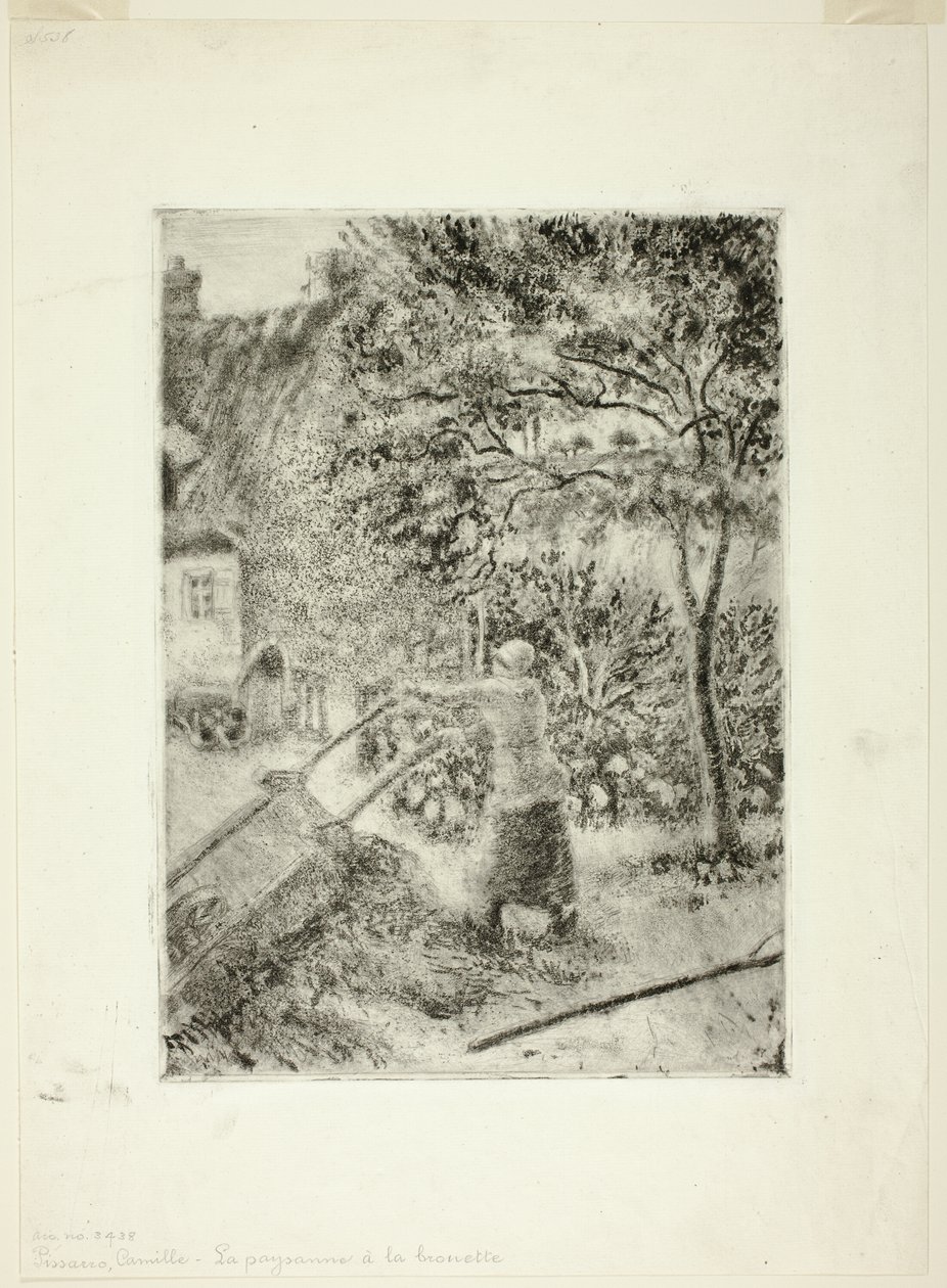 Kvinde tømmer en trillebør af Camille Pissarro