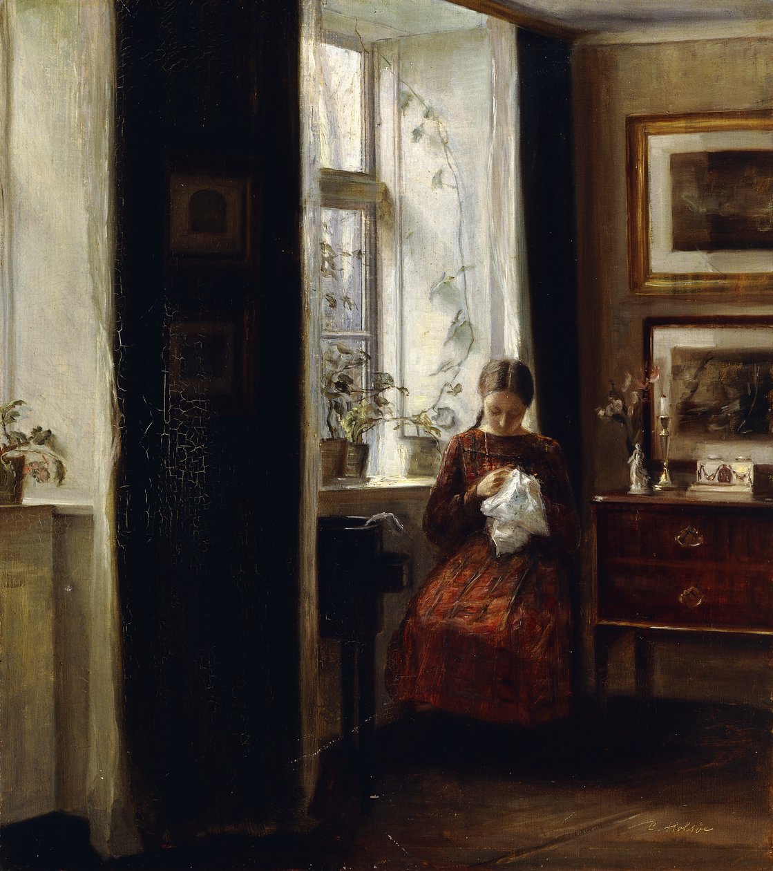 En ung pige, der syr af Carl Holsoe