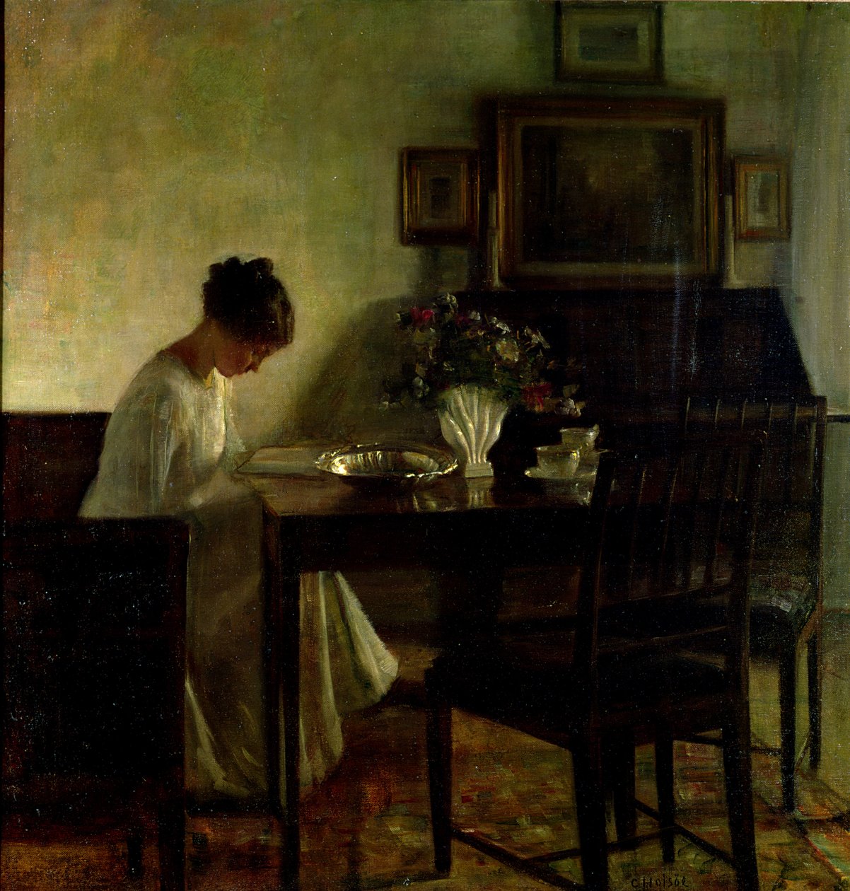 Pige læser i et interiør af Carl Holsoe