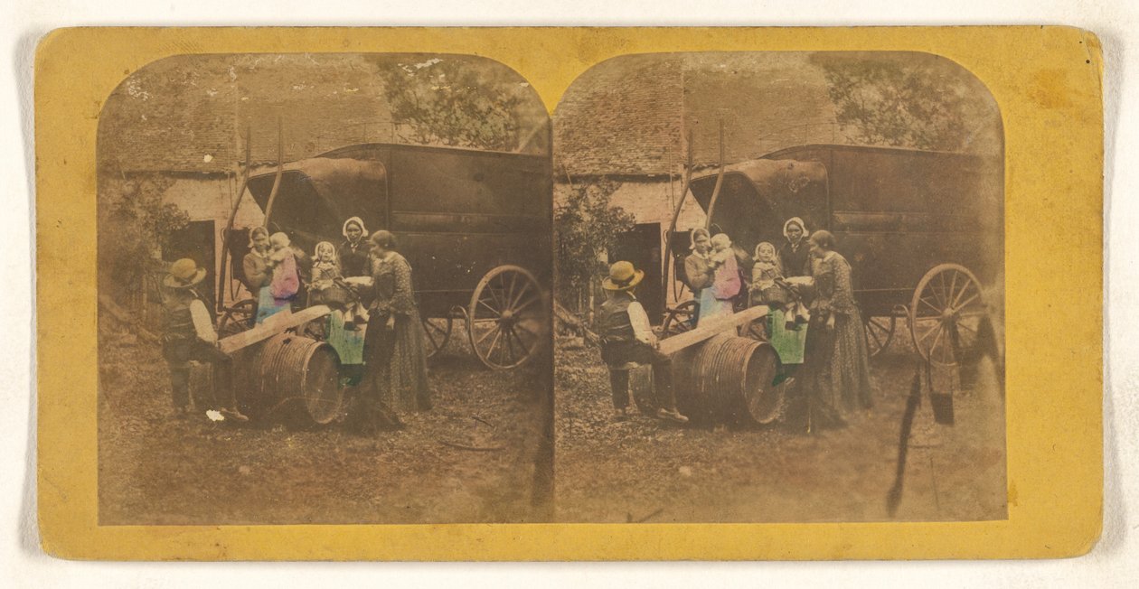 [Familiegruppe foran en vogn, far og barn på provisorisk vippe]. af Charles Peeters
