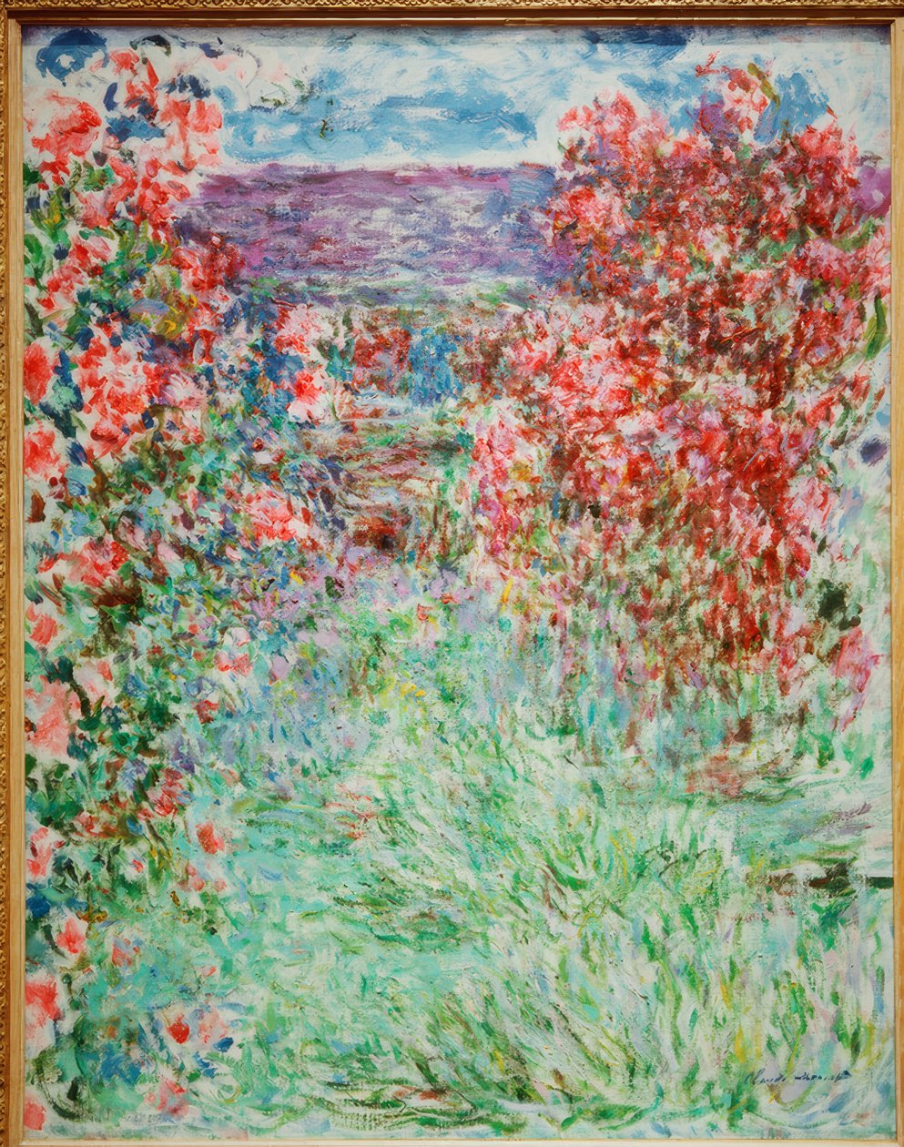 Huset blandt roserne af Claude Monet
