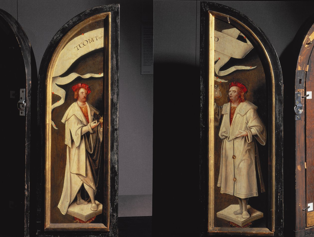 The Cleansing of Naaman Triptykon: sidepaneler, der forestiller martyrerne Cosmas og Damian, beskyttere mod sygdom, 1520 (panel) af Cornelis Engebrechtsz