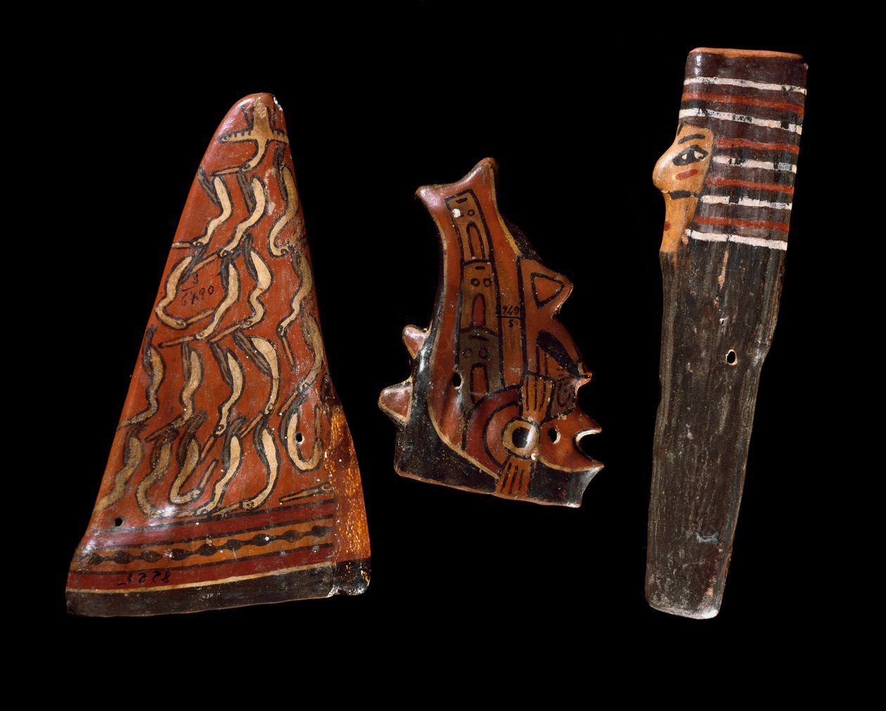 Før colombiansk kunst, Nazca-civilisation: musikinstrumenter af træ (inklusive panfløjte?). 100 f.Kr.-800 e.Kr. Lima, Arkæologisk Museum af Culture Nazca