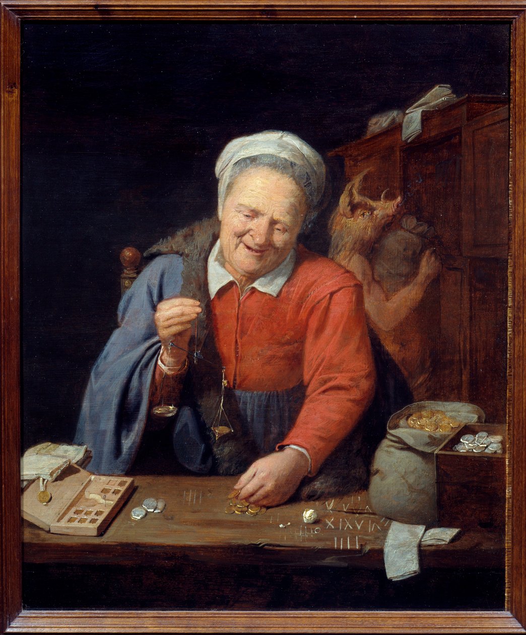 Guldvægteren. En gammel kvinde med en lille vægt vejer guldstykkerne, mens en mand med ornehoved i bunden gemmer poser i skabet. Maleri af David III Ryckaert (1612-1661) Ec. Flam. af David III Ryckaert