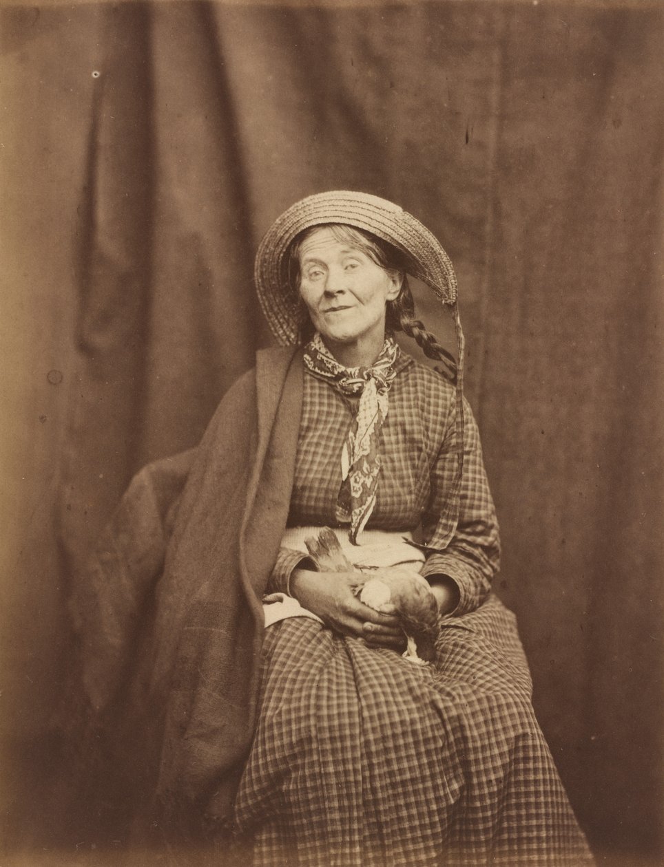 Kvinde holder en død fugl, Surrey County Asylum af Dr. Hugh Welch Diamond