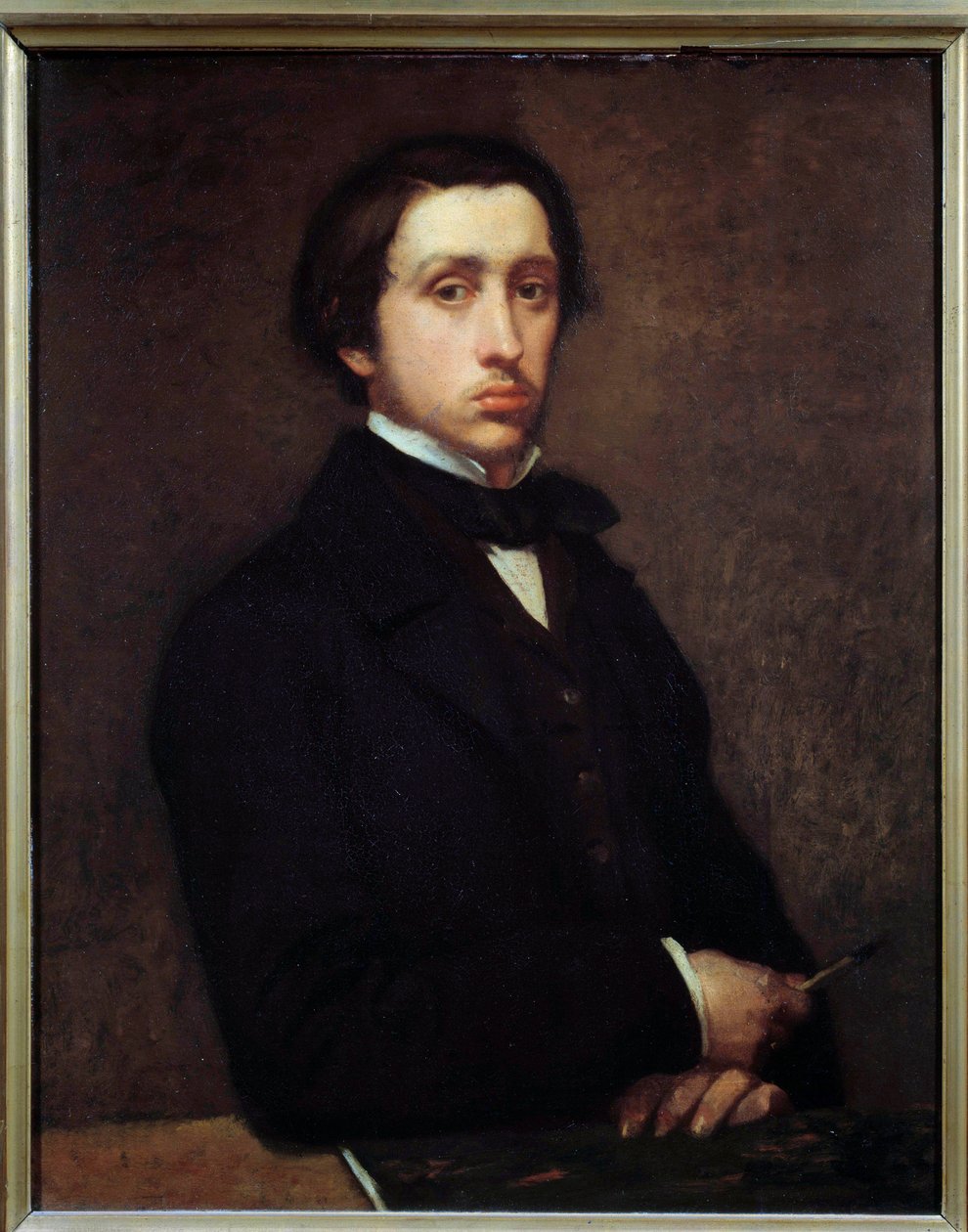 Selvportræt eller Degas i portrætmaleri af Edgar Degas (1834-1917) 1855 Søn. 0,81x0,64 m Paris, musee d