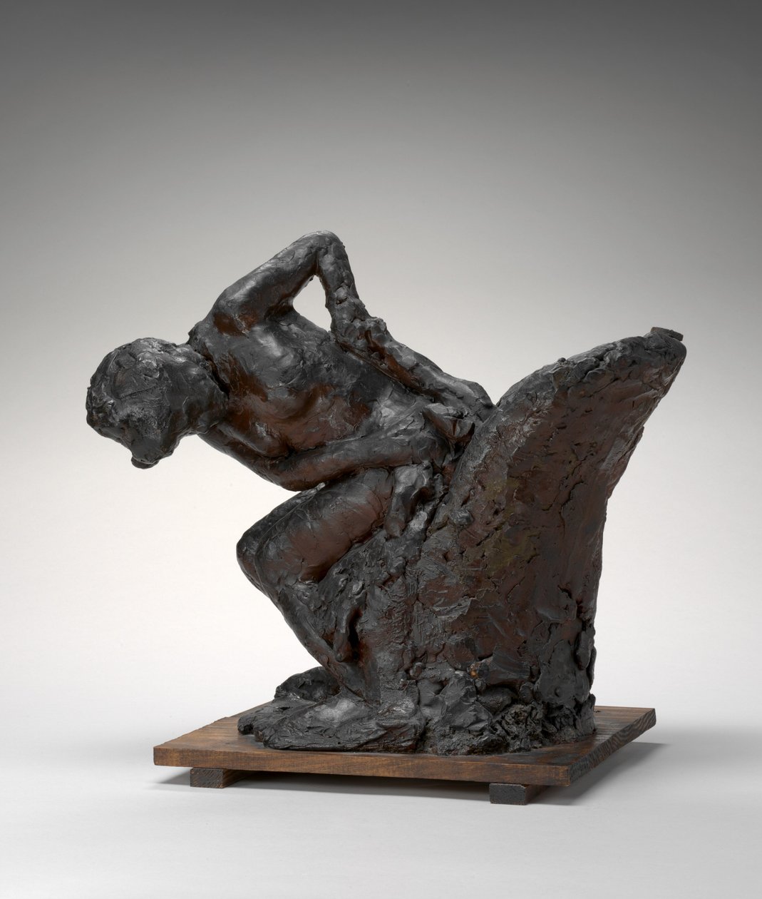 Siddende kvinde, tørrer sin venstre hofte, 1890
