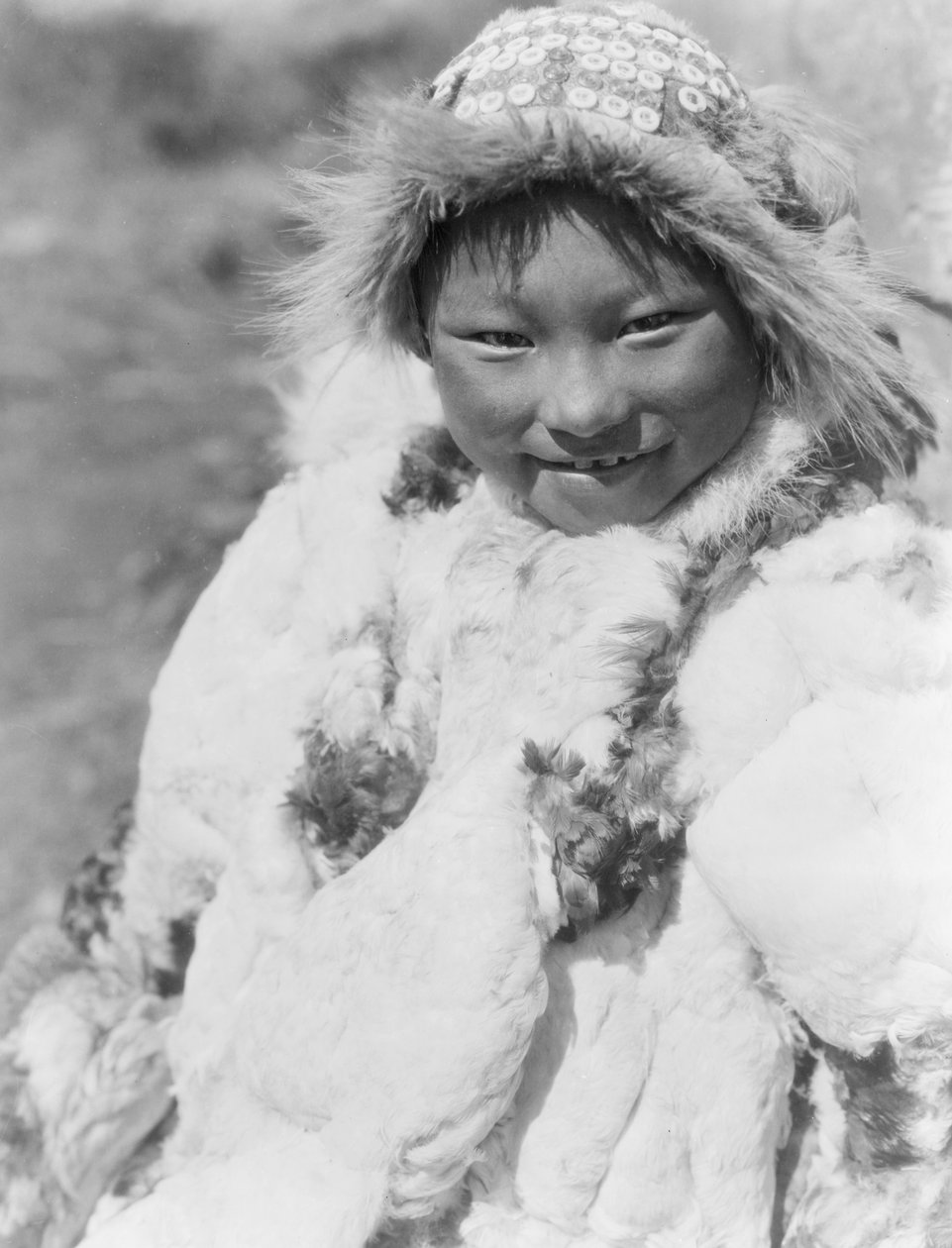 Eskimo-barn identificeret som Uyowutcha, sandsynligvis fra Nunivak Island, Alaska, ca. 1929 (s/h-foto) af Edward Sheriff Curtis