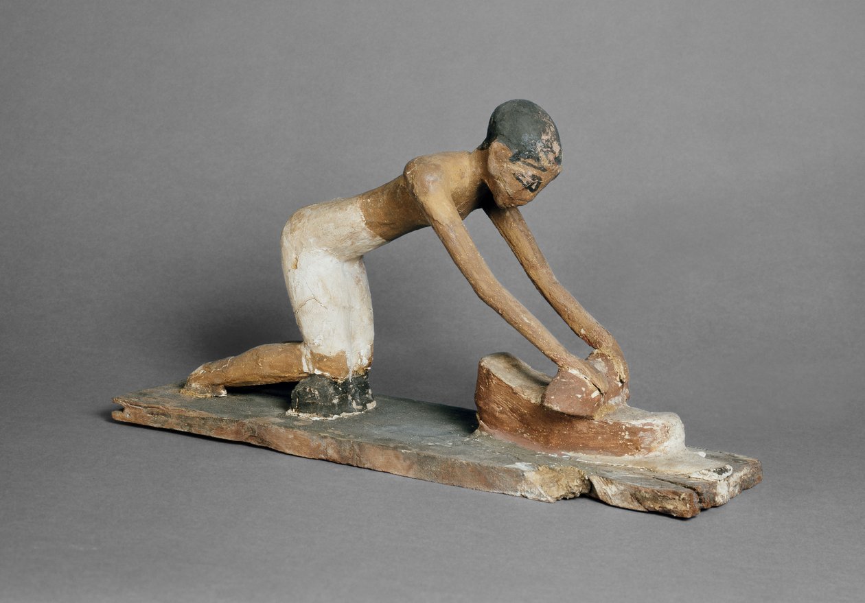 Model af en kvinde, der maler majs, egyptisk, fundet ved Sidmant (polykromt træ) af Egyptian 6th Dynasty