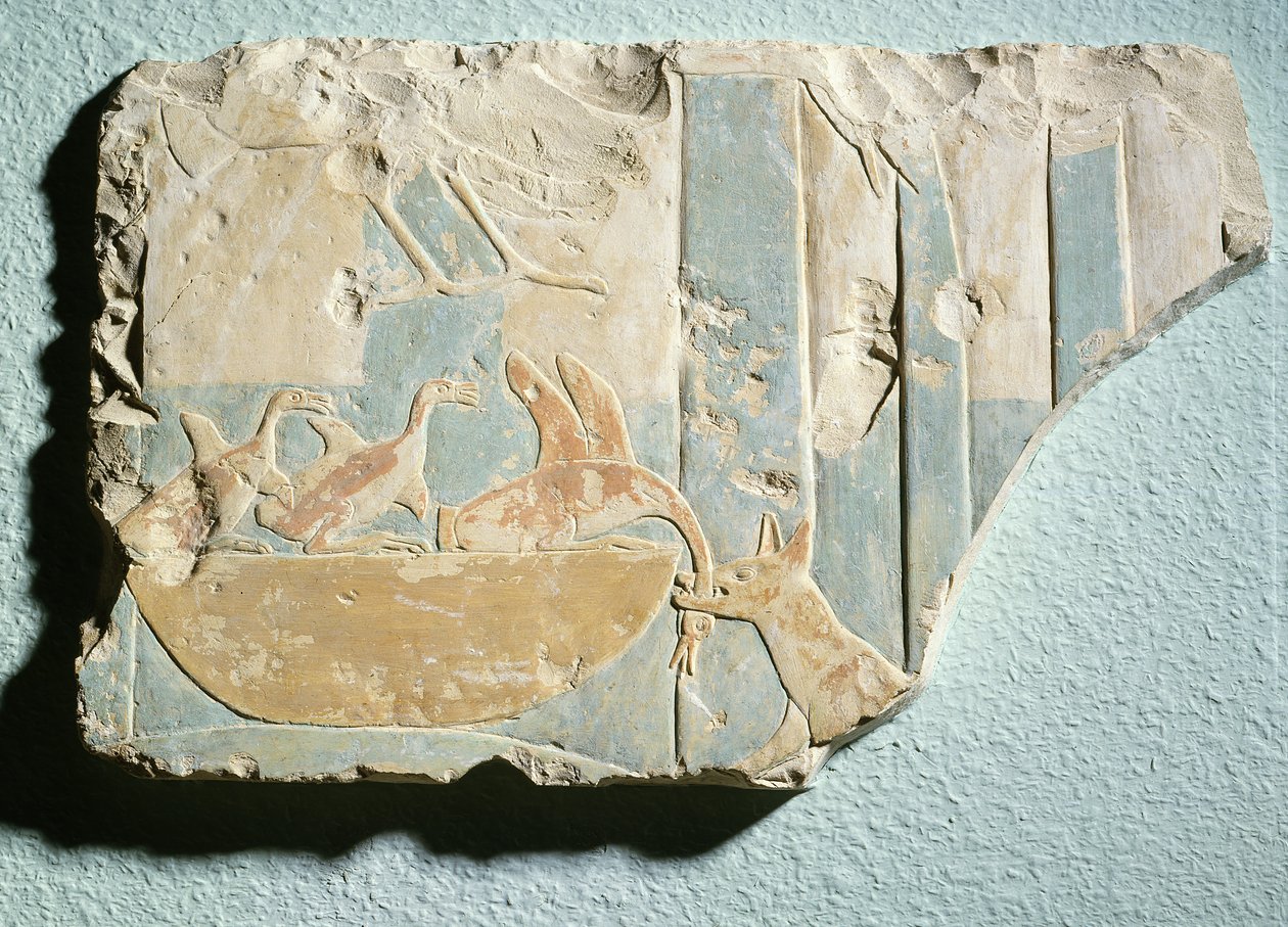 Relief, der viser et angreb af et hundelignende dyr på en fuglerede, fra kong Montuhotep II