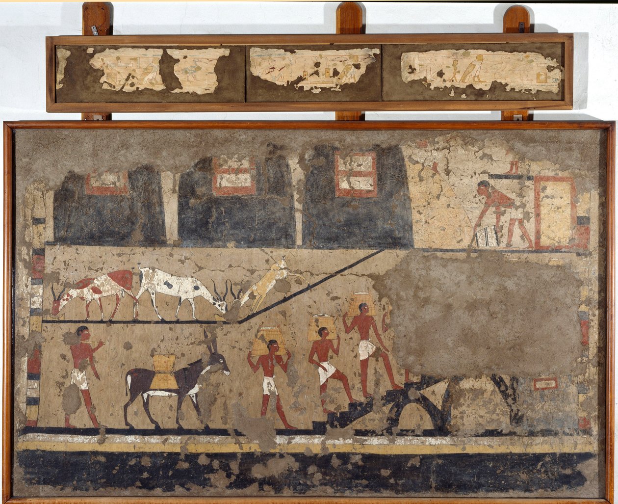 Egyptisk antikvitet: transport af hvede på ryggen af muldyr og på ryggen af mænd. Detrempe på ler og halm fra graven til kong Itis general og kansler i El Ghebelen nær Luxor. 2200-2000 f.Kr. Torino, egyptisk museum af Egyptian Egyptian