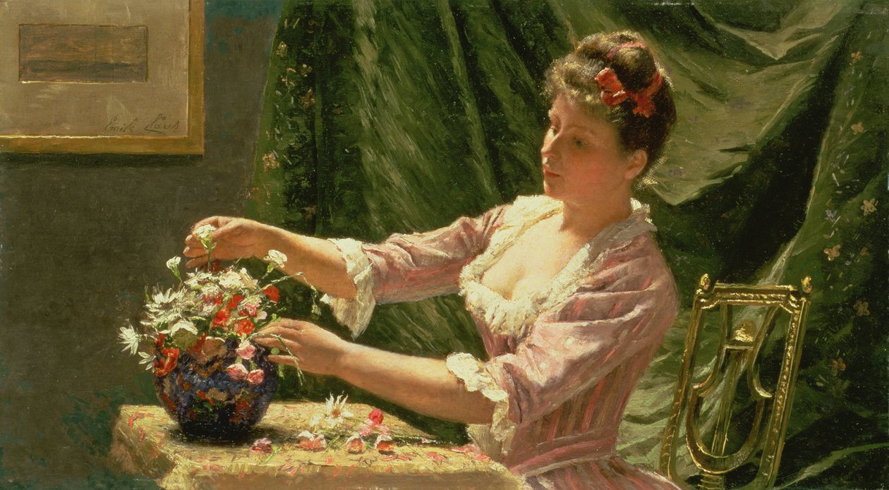 Ung kvinde arrangerer blomster af Emile Claus