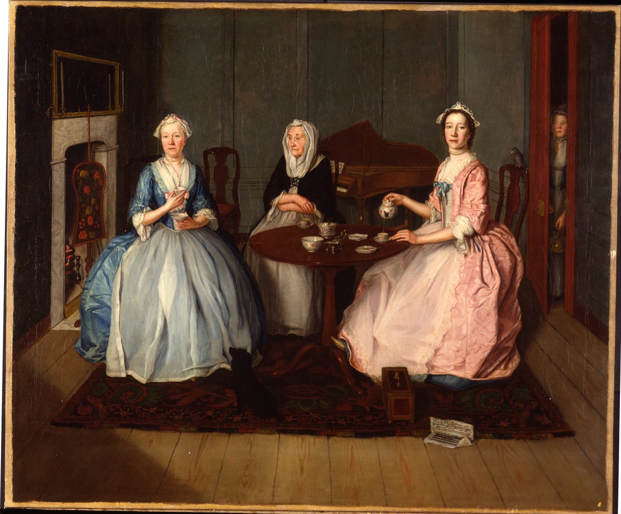 En familie i et indre tager te, ca. 1740 af English School