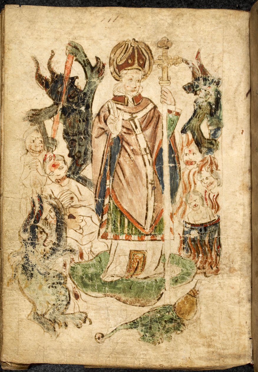 Saint Patrick, i biskoppens dragt, holder et krucifiks og laver en velsignelsesgest, står på øen Lough Derg, Donegal (Irland), omgivet af dæmoner og plagede sjæle. Billede taget fra ""Skærsilden fra Saint Patrick"", engelsk manuskript, m af English School