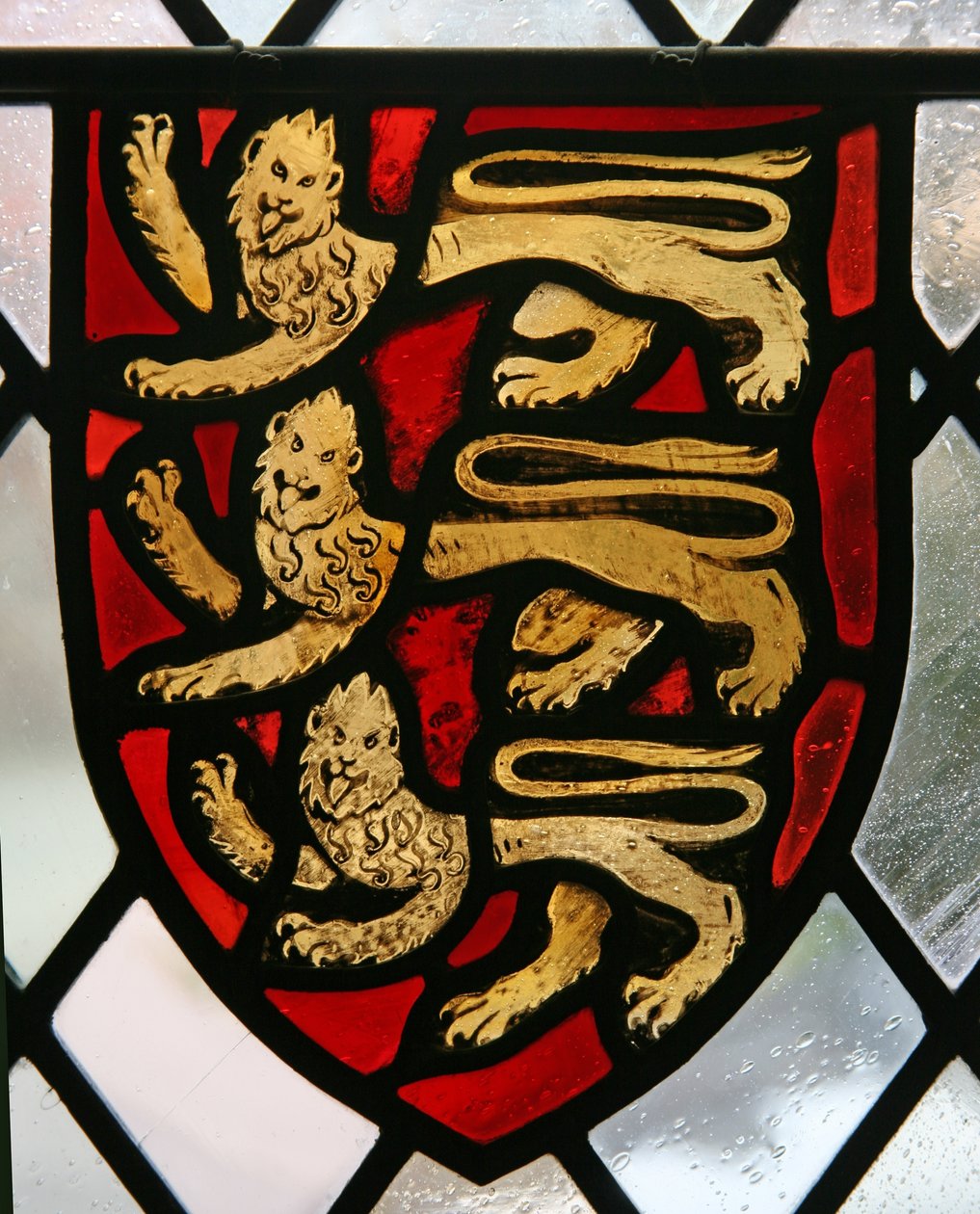 Vinduesklostre, der viser Englands våbenskjold af English School