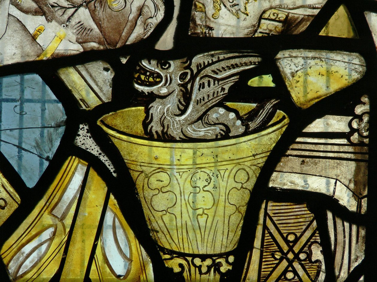 Vindue s3, der forestiller en djævel i en kalk - sandsynligvis fra et panel af St. John af English School