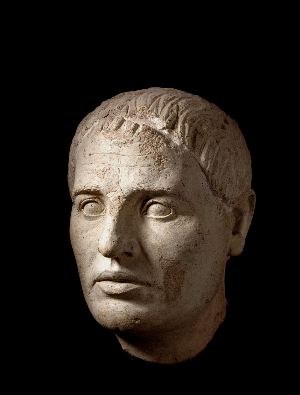 Hoved af en mand, i lyst ler, 2. århundrede f.Kr af Etruscan