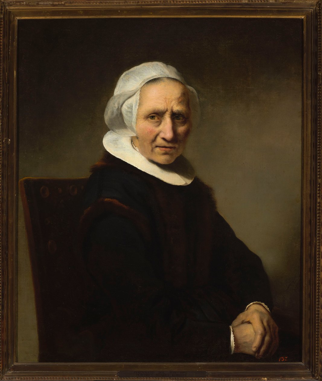 Portræt af en gammel kvinde med hvid kyse af Ferdinand Bol