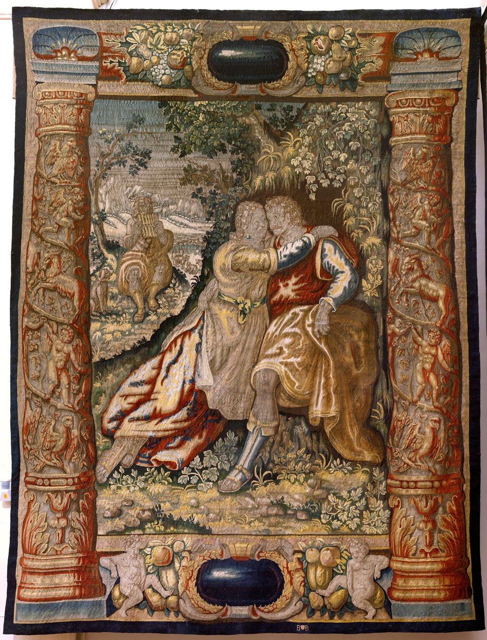 flamsk gobelin. Serie Gallantry (Galante). Par med musiker (Pareja con músico). Fremstilling Bruxelles, begyndelsen af det 17. århundrede. Stof Silke og uld, 5/6 kædegarn pr. cm. Størrelse 348 x 263 cm. Placering San Millán de la Cogolla Kirke, Oncala (Sor af Flemish School