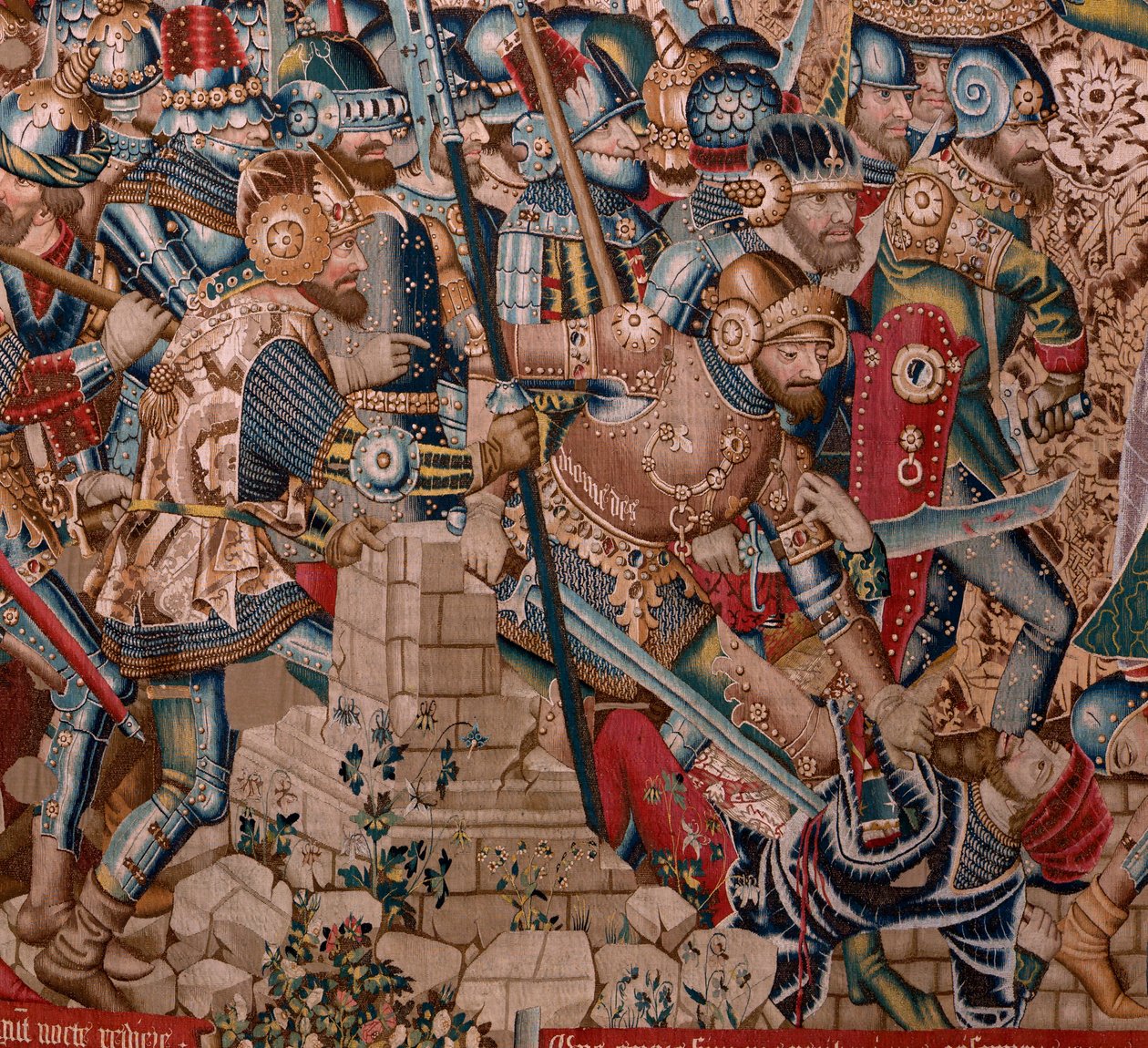 flamsk gobelin. Serien Den trojanske krig. Trojas ødelæggelse (Destrucción de Troya). Elvte gobelin i serien. Model Coëtivy Master (Henry eller Conrard de Vulcop). Fremstiller Tournai-værksteder. Ca 1470. Stof Uld og silke, 6/7 kædegarn pr. cm. af Flemish School